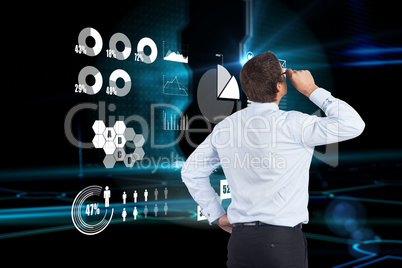 Composite image of thinking businessman tilting glasses