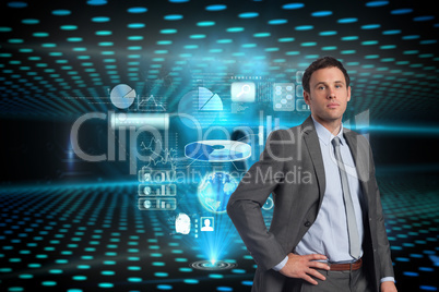 Composite image of serious businessman with hand on hip