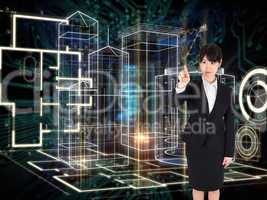 Composite image of focused businesswoman pointing