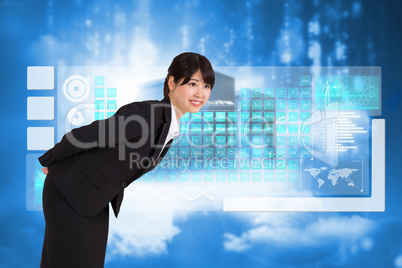 Composite image of smiling businesswoman bending