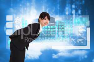 Composite image of smiling businesswoman bending