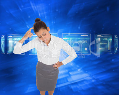 Composite image of worried businesswoman