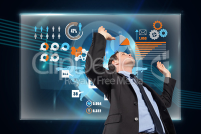 Composite image of businessman posing with arms raised