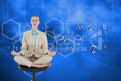 Composite image of peaceful chic businesswoman sitting in lotus