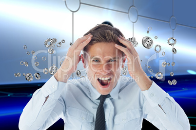 Composite image of stressed businessman shouting