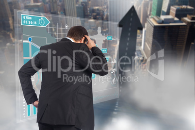 Composite image of thinking businessman scratching head