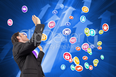 Composite image of businessman posing with arms raised