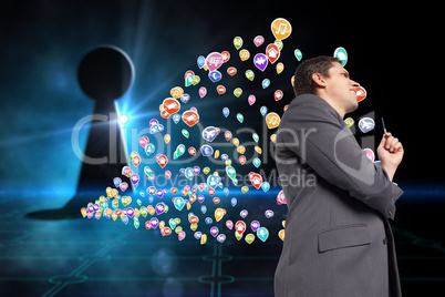 Composite image of thoughtful businessman holding pen