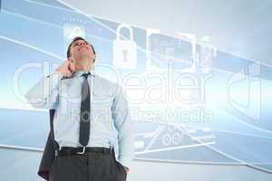 Composite image of smiling businessman holding his jacket