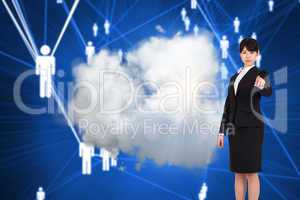 Composite image of focused businesswoman pointing