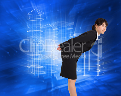 Composite image of serious businesswoman bending