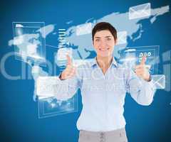 Composite image of businesswoman with the thumbs up