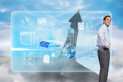 Composite image of smiling businessman with hand on hip Composite image of smiling businessman with hand on hip