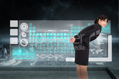 Composite image of smiling businesswoman bending