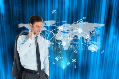 Composite image of smiling businessman holding his jacket