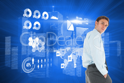 Composite image of serious businessman standing with hands in po Composite image of serious businessman standing with hands in po