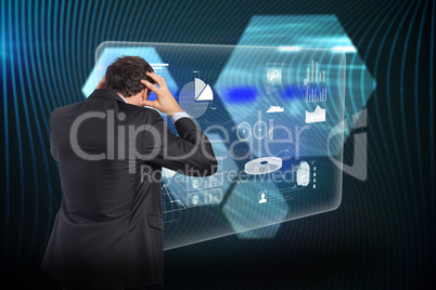 Composite image of stressed businessman with hands on head