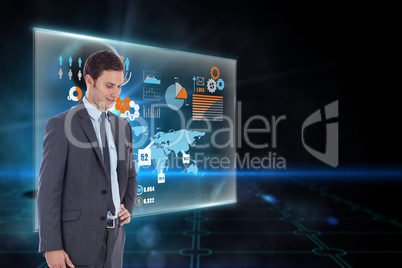 Composite image of smiling businessman with hand on hip