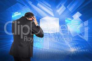 Composite image of stressed businessman with hands on head