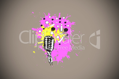 Composite image of microphone on paint splashes