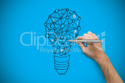 Composite image of hand holding a silver pen