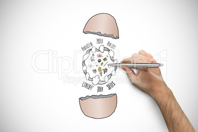 Composite image of hand holding a silver pen