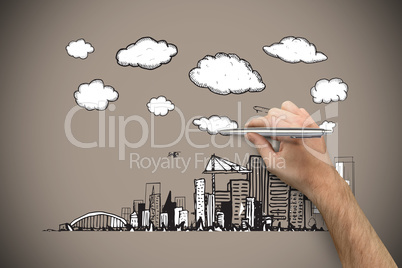 Composite image of hand holding a silver pen