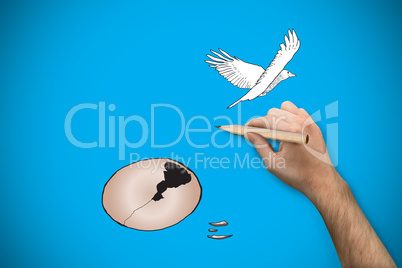 Composite image of hand holding a pencil