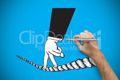 Composite image of hand holding a silver pen