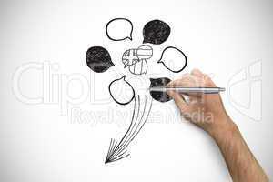 Composite image of hand holding a silver pen