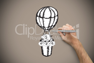 Composite image of hand holding a silver pen