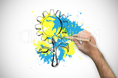 Composite image of hand holding a pencil