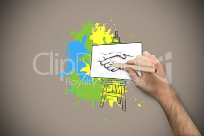 Composite image of hand holding a pencil