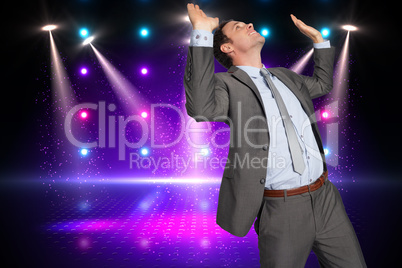 Composite image of businessman standing with arms pressing up