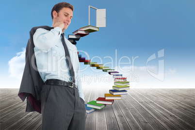 Composite image of smiling businessman holding his jacket