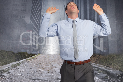 Composite image of businessman standing with arms pushing up