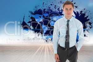 Composite image of serious businessman with hand in pocket