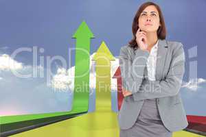 Composite image of focused businesswoman