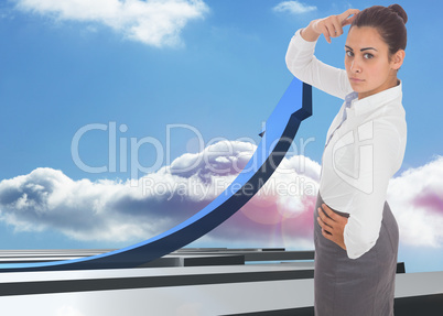 Composite image of focused businesswoman