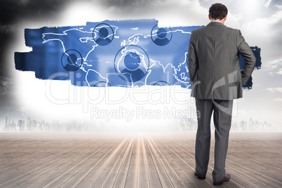 Composite image of businessman with hand on hip Composite image of businessman with hand on hip
