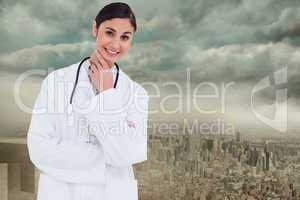 Composite image of smiling female doctor in thinkers pose