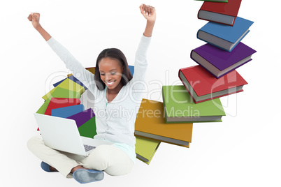 Composite image of young woman stretching while on the floor wit