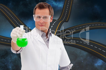 Composite image of young scientist working with a beaker