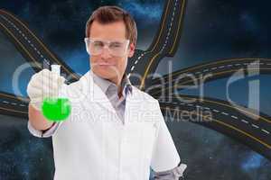 Composite image of young scientist working with a beaker