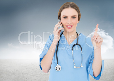 Composite image of pretty woman doctor phoning and pointing with