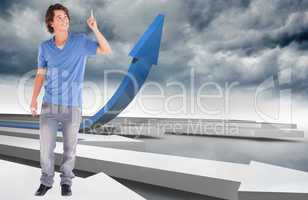 Composite image of handsome guy pointing