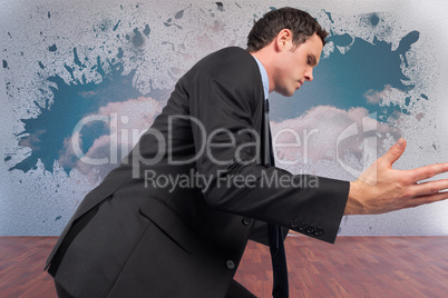 Composite image of businessman posing with arms out