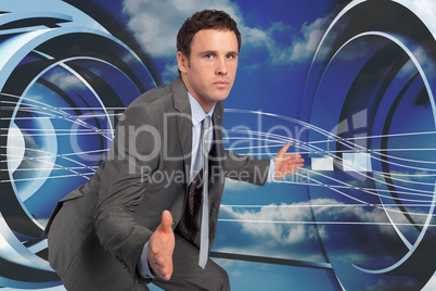 Composite image of businessman posing with hands out