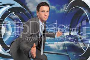 Composite image of businessman posing with hands out