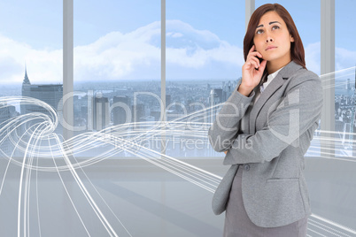 Composite image of thinking businesswoman